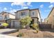 Beautiful two-story house with desert landscaping and a two-car garage at 2740 Aldine Ct, Las Vegas, NV 89142