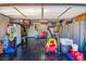 This well-organized garage features a clean epoxy floor and ample storage cabinets at 306 Dedication Ave, Henderson, NV 89011