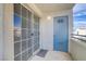 A small balcony showcases a sliding glass door and a blue storage closet at 3318 N Decatur Blvd # 2007, Las Vegas, NV 89130