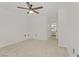 Bedroom featuring gray carpet, a ceiling fan, and a view of the bathroom at 3318 N Decatur Blvd # 2007, Las Vegas, NV 89130
