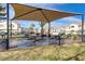 Community area provides shade structure and picnic tables for residents to enjoy outdoor dining and relaxation at 3318 N Decatur Blvd # 2007, Las Vegas, NV 89130