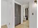 Hallway leading to bathroom, with neutral walls and light hardwood flooring at 3318 N Decatur Blvd # 2007, Las Vegas, NV 89130