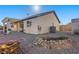 Attractive backyard featuring rock landscaping and a covered patio at 341 Dylan Pl, Pahrump, NV 89048