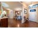 Foyer featuring hardwood floors, and views of the dining area with a view to the front door at 341 Dylan Pl, Pahrump, NV 89048