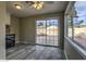 Dining area with tile floor, sliding glass door to backyard, ceiling fan, and plenty of natural light at 4522 Via San Rafael, Las Vegas, NV 89103