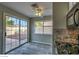 Bright eat-in kitchen featuring tile floors, a window with backyard views, and a sliding door to the patio at 4522 Via San Rafael, Las Vegas, NV 89103