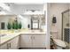 This bathroom has a double sink and large mirrors at 4827 S Torrey Pines Dr # 204, Las Vegas, NV 89103