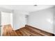 Bedroom featuring wood-look flooring, neutral walls, and a closet at 4827 S Torrey Pines Dr # 204, Las Vegas, NV 89103