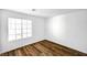 Bedroom featuring wood-look flooring and bright natural light at 4827 S Torrey Pines Dr # 204, Las Vegas, NV 89103