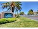 Los Verdes community sign surrounded by green lawn and a mature palm tree on a clear, sunny day at 4827 S Torrey Pines Dr # 204, Las Vegas, NV 89103