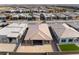 An aerial view showcases the desert landscaping of a modern single-Gathering home in a residential community at 5015 Terramont Dr, Las Vegas, NV 89135