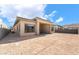 Exterior rear view of home featuring stucco and modern architectural elements at 5015 Terramont Dr, Las Vegas, NV 89135