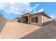 Exterior rear view of home featuring stucco and modern architectural elements at 5015 Terramont Dr, Las Vegas, NV 89135