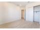 Bright bedroom boasts tile floors, neutral walls, and closet access at 5015 Terramont Dr, Las Vegas, NV 89135