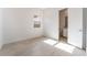 Bright bedroom showcases tile flooring with a neutral wall color and natural light from the window at 5015 Terramont Dr, Las Vegas, NV 89135