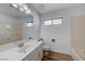 Bathroom features a tub/shower, and large mirror at 519 Cayuga Ct, Boulder City, NV 89005