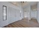 Bright foyer featuring new flooring, high ceilings, and double door entry at 519 Cayuga Ct, Boulder City, NV 89005