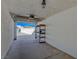 Attached garage with open door showing shelving at 519 Cayuga Ct, Boulder City, NV 89005