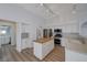 Bright kitchen with a wood-topped island and stainless steel appliances at 519 Cayuga Ct, Boulder City, NV 89005