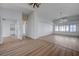 Open-concept living room featuring new floors, neutral walls, and open floor plan at 519 Cayuga Ct, Boulder City, NV 89005