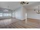 Open-concept living room featuring new floors, neutral walls, and ample natural light at 519 Cayuga Ct, Boulder City, NV 89005