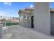 Large balcony with stucco walls and tiled roof views at 5264 Silverheart Ave, Las Vegas, NV 89142