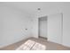 Comfortable bedroom featuring neutral carpeting and a closet with sliding doors at 5264 Silverheart Ave, Las Vegas, NV 89142