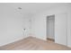 Neutral bedroom with a closet and a white door at 5264 Silverheart Ave, Las Vegas, NV 89142