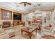 Cozy living room features a fireplace, hardwood floors, and comfortable seating at 5434 Pendini Point Ct, Las Vegas, NV 89141