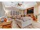 Comfortable living room with hardwood floors, neutral colors, and great natural light at 5434 Pendini Point Ct, Las Vegas, NV 89141