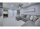 Relaxing living room with comfortable seating, neutral colors, and ample natural light at 5507 Nickel Ridge Way, Las Vegas, NV 89122