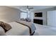 Well-lit main bedroom with modern furnishings, neutral tones, and comfortable seating area at 5507 Nickel Ridge Way, Las Vegas, NV 89122