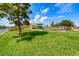 Community playground on well-manicured lawn, creating a fun outdoor space for residents at 5507 Nickel Ridge Way, Las Vegas, NV 89122