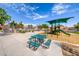 Community playground with picnic tables providing a recreational space for gatherings and activities at 5507 Nickel Ridge Way, Las Vegas, NV 89122