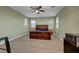 Comfortable bedroom featuring a ceiling fan and natural light at 5736 Clear Haven Ln, North Las Vegas, NV 89081