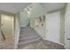 Inviting entryway features tiled floors and staircase to upper level at 5736 Clear Haven Ln, North Las Vegas, NV 89081