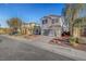 Street view of a two-story home with a two-car garage and low-maintenance landscaping at 5736 Clear Haven Ln, North Las Vegas, NV 89081