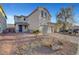 Two-story home with a well-kept front yard and a brick-paved driveway leading to the garage at 5736 Clear Haven Ln, North Las Vegas, NV 89081