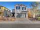 Charming two-story home with a brick driveway and a well-maintained front yard at 5736 Clear Haven Ln, North Las Vegas, NV 89081