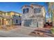 Beautiful two-story house with neutral-toned exterior, desert landscaping, and an attached two-car garage at 5736 Clear Haven Ln, North Las Vegas, NV 89081