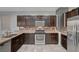 Modern kitchen equipped with stainless steel appliances and ample counter space at 5736 Clear Haven Ln, North Las Vegas, NV 89081