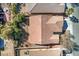 Overhead view of the home's roof, mature landscaping, and adjacent fenced yards at 5891 Alfano Ave, Pahrump, NV 89061