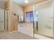 Well-lit bathroom boasting a soaking tub and a separate glass-enclosed shower at 5891 Alfano Ave, Pahrump, NV 89061