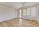 Bright bedroom featuring a ceiling fan, blinds, and a door to the outside at 5965 Poplar Tree St, Las Vegas, NV 89148