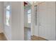 Clean entryway featuring tile flooring, white walls, a view into adjacent rooms, and a bright, welcoming atmosphere at 5965 Poplar Tree St, Las Vegas, NV 89148