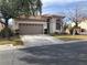 Charming single-story home with a tile roof, two car garage and well-maintained landscaping at 5965 Poplar Tree St, Las Vegas, NV 89148