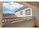 Balcony view of neighborhood featuring desert landscaping and tile roofs at 6116 Casa Antiqua St, North Las Vegas, NV 89081