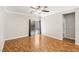 Bright bedroom featuring a ceiling fan and sliding door at 6116 Casa Antiqua St, North Las Vegas, NV 89081