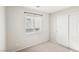 This is a standard-sized bedroom, featuring a window and a standard-sized closet at 6116 Casa Antiqua St, North Las Vegas, NV 89081