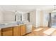 Kitchen view features stone countertops and stainless steel appliances at 6116 Casa Antiqua St, North Las Vegas, NV 89081